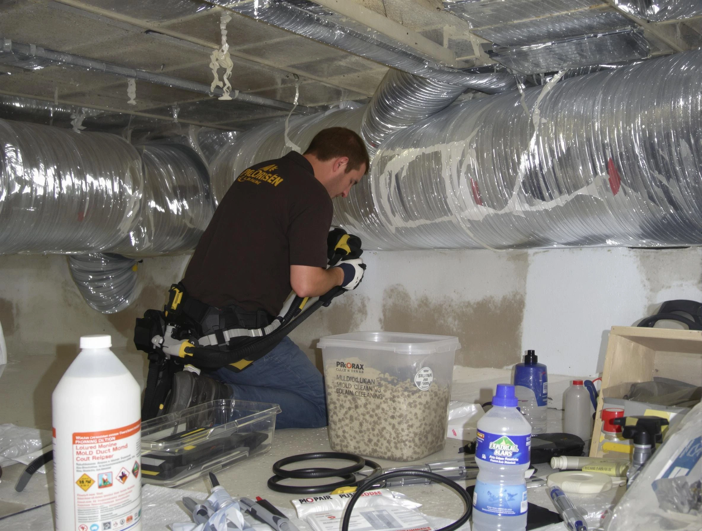 Burlington Air Duct Cleaning specialist performing professional mold removal from air ducts in Burlington